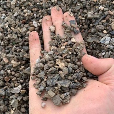 410 gravel in hand 4/10 gravel in a hand