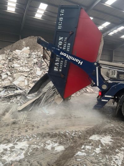plasterboard skip being offloaded plasterboard skip being offloaded