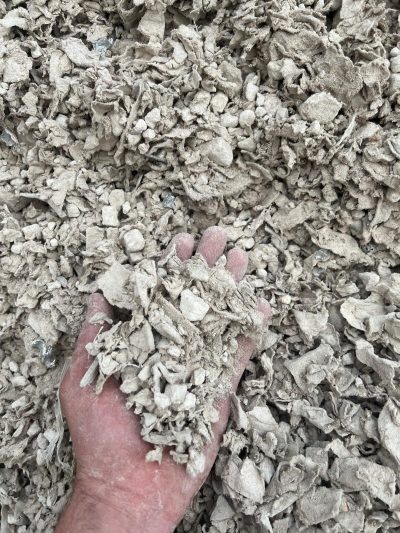 Shredded plasterboard small pieces Shredded plasterboard small pieces